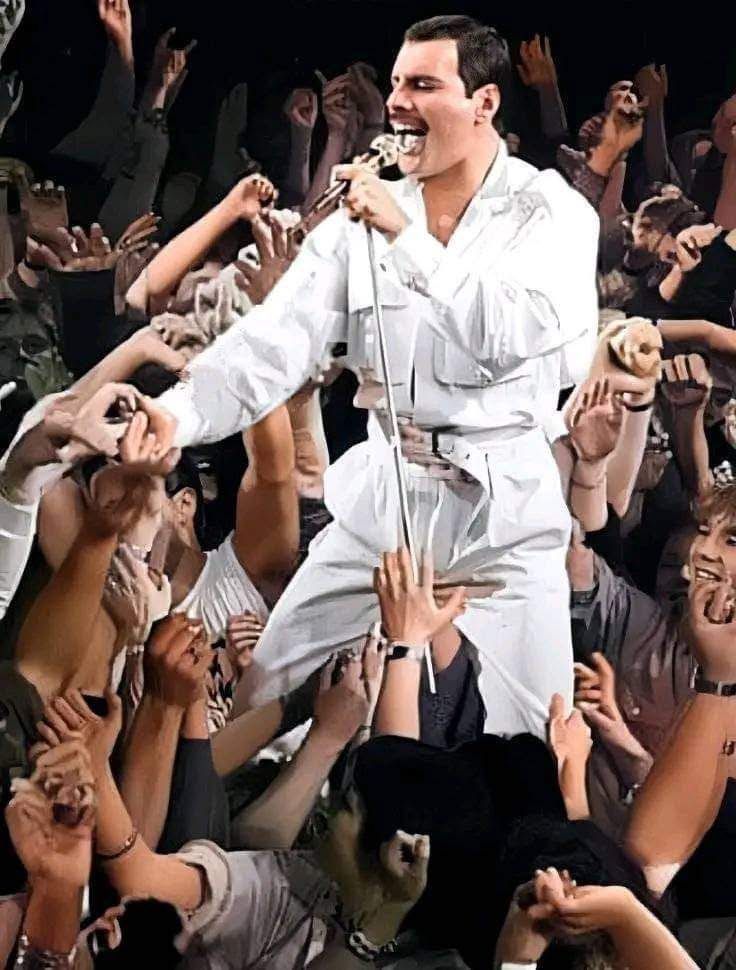 Freddie Mercury commanding the crowd at Wembley Stadium