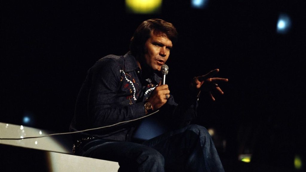 Glen Campbell performing Rhinestone Cowboy on stage